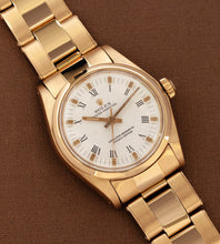 Afbeelding in Gallery-weergave laden, Rolex Oyster Perpetual 6748 'White Buckley Dial / 18K Gold / Riveted Oyster / 31mm' (1978)