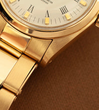 Afbeelding in Gallery-weergave laden, Rolex Oyster Perpetual 6748 'White Buckley Dial / 18K Gold / Riveted Oyster / 31mm' (1978)
