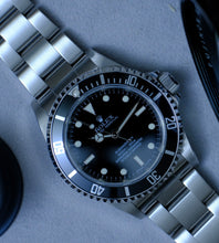 Afbeelding in Gallery-weergave laden, Rolex Submariner 14060M from 2006/2007 + Box
