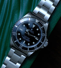 Afbeelding in Gallery-weergave laden, Rolex Submariner 14060M from 2006/2007 + Box
