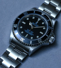 Afbeelding in Gallery-weergave laden, Rolex Submariner 14060M from 2006/2007 + Box