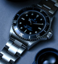 Afbeelding in Gallery-weergave laden, Rolex Submariner 14060M from 2006/2007 + Box