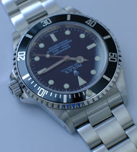 Afbeelding in Gallery-weergave laden, Rolex Submariner 14060M from 2006/2007 + Box