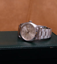 Load image into Gallery viewer, Rolex Date 15200 from 1991 + Box & Papers (unworn)
