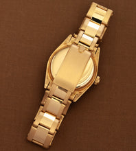 Afbeelding in Gallery-weergave laden, Rolex Oyster Perpetual 6748 &#39;White Buckley Dial / 18K Gold / Riveted Oyster&#39; (1978)
